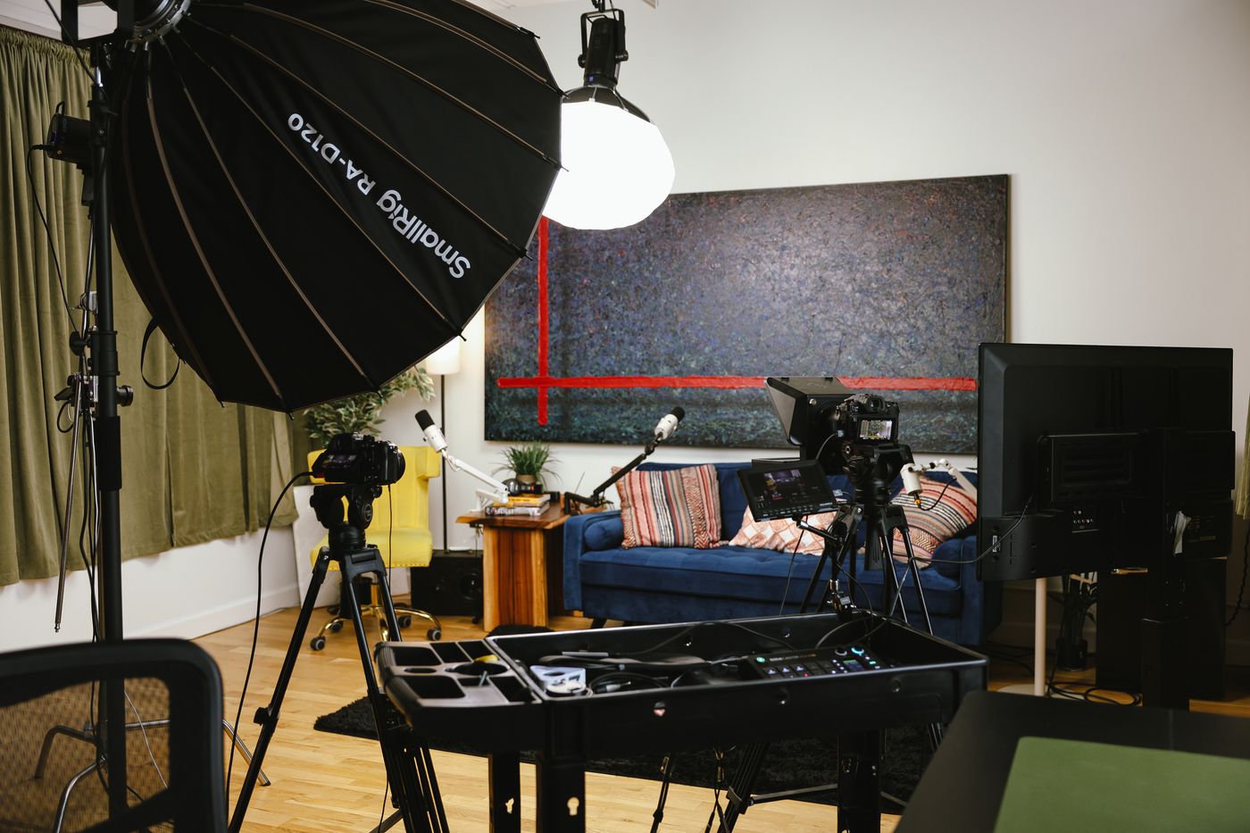 Couch podcast set with cameras and studio lighting at XYZ Studios Chicago